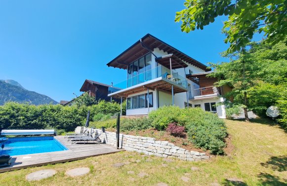 Property in 4866  Salzkammergut - Unterach am Attersee: Design meets nature!  Luxurious detached house with a view of Lake Attersee