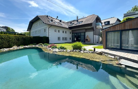 Property in 5020 Salzburg - Morzg: Design loft in a manor house with swimming pond in a prime Salzburg location!